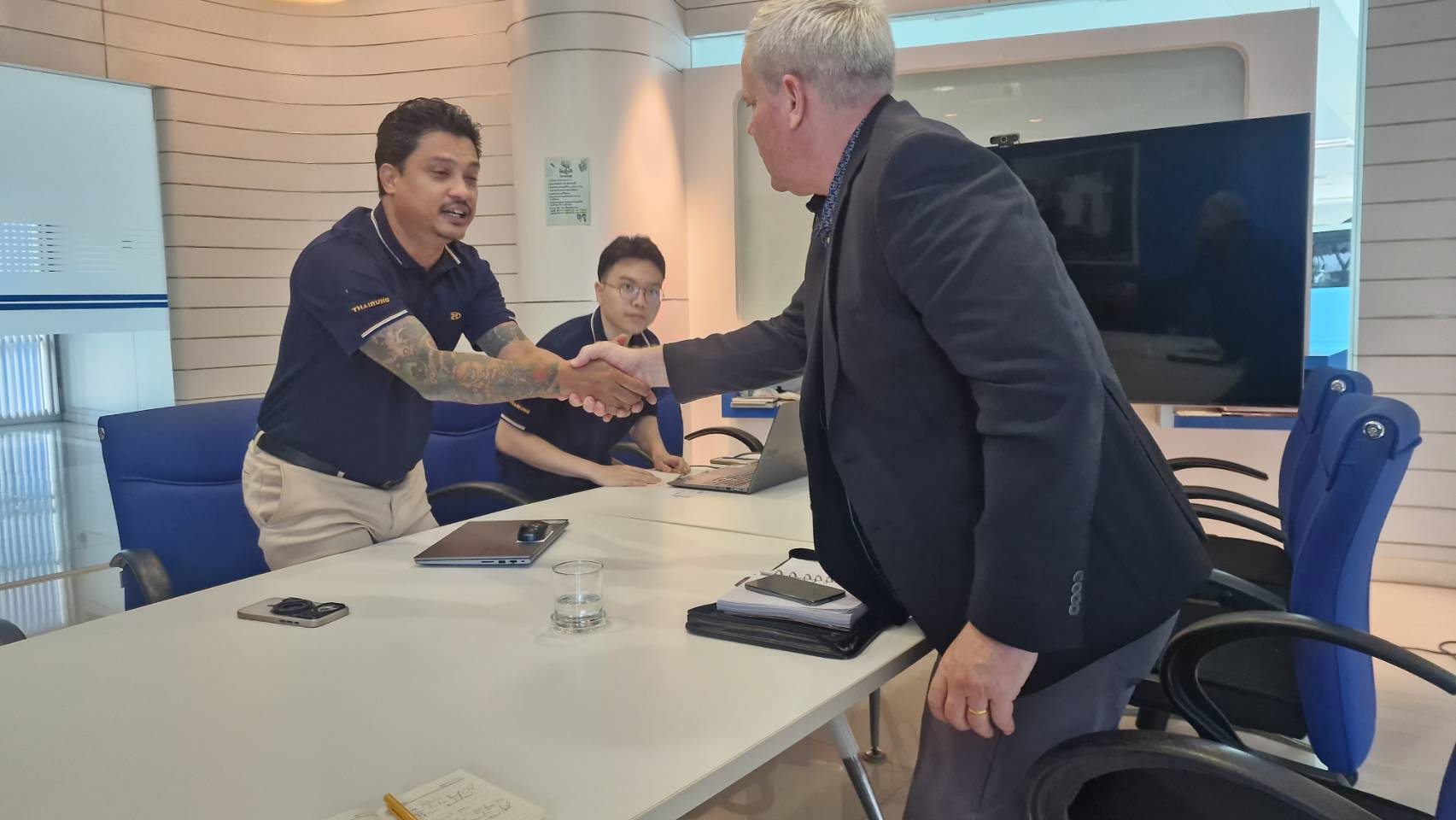 Business meeting with Thai manufacturing partners